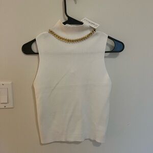 White tank top and pants set with gold detail
